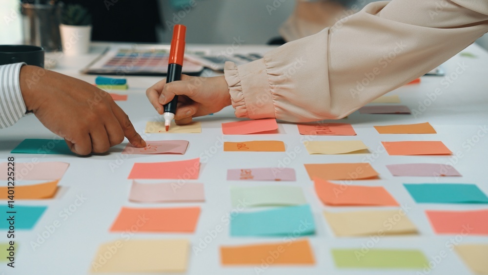 Poster a vibrant brainstorming session captures team members actively engaged in a creative process using c