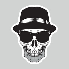 A skull with a skull and a black background with spots