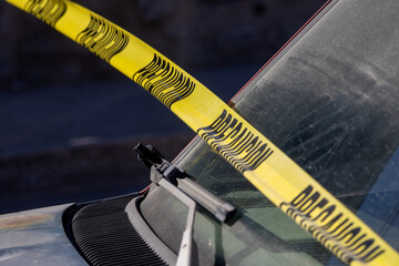 Cluster of yellow forensic markers numbered 1 to 19 scattered across a wide urban street