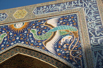 bright mosaic of ceramic tiles above the entrance arch of the madrasah, Bukhara