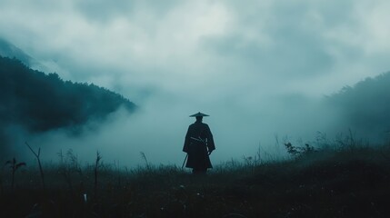 Mysterious figure stands amidst foggy mountains at dawn in a tranquil and serene landscape
