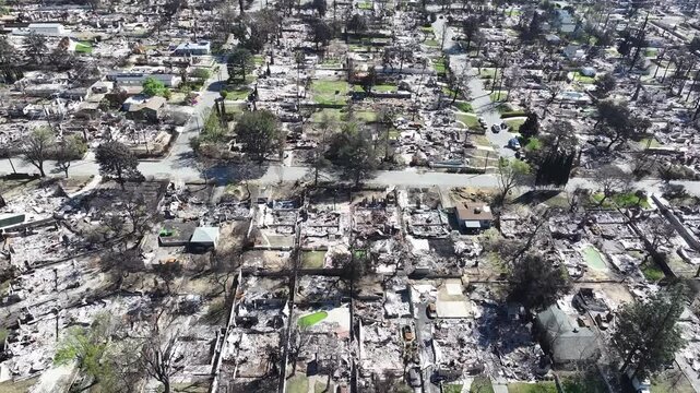 Aerial view of the aftermath of LA fires with burnt ashes and destroyed homes in Altadena neighborhood in Los Angeles, California.