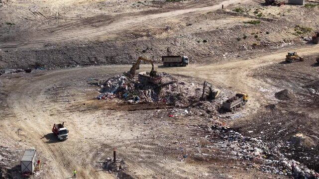Waste processing plant activities showcasing machinery for efficient waste management in operation