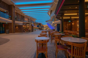 Interior of an empty, dimly lit cruise shop