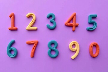 Set of Handmade Plasticine Numbers on a Purple Background. Collection of math figures made by hand from play dough 