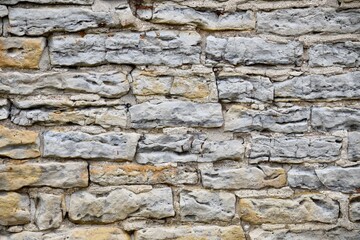 old stone wall deteriorating texture