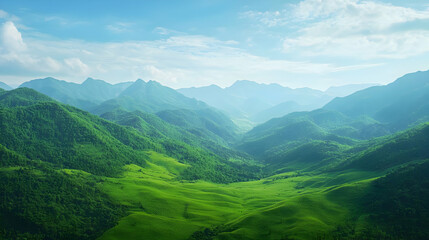 Fototapeta premium Vast Green Mountain Valley Under Clear Sky