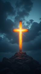 A dramatic sky with a large cross silhouetted against it on a mountain top.