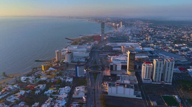 Cool morning over Veracruz in the municipality of Boca del Rio by the sea. Sunlight illuminates the buildings in warm tones.