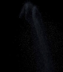 Obraz premium Microscopic dust motes dance in air current against stark black backdrop, microscopic, simple