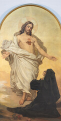FLORENCE, ITALY - MARCH 18, 2025: The painting of apparition of Heat of Jesus to St. Margaret Mary Alacoque in the church Chiesa del Sacro Cuore by Antonio Ciseri (1880). © Renáta Sedmáková