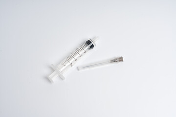 Medical syringe with needle isolated on white background