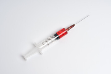 Medical syringe with needle isolated on white background