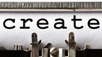 Vintage typewriter focusing on the word "create"  