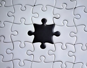 Obraz premium una pieza de puzzle negro sobrepuesta un poco movida en un puzzle blanco