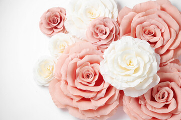 Beautiful paper flowers on white background, flat lay