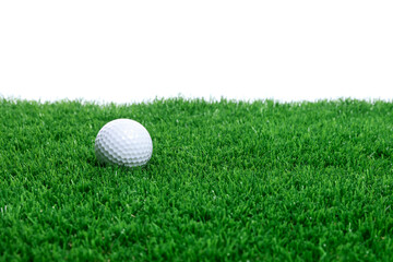 Golf ball on green grass against white background