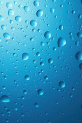 Blue Vertical Background with Transparent Drops – A Refreshing and Calm Scene.