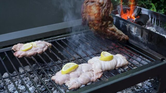 cocinando a la parrilla asado argentino, achuras y vac&iacute;o