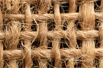 Macro close-up capturing interwoven textile fibers, highlighting complex pattern, delicate texture, and sophisticated weaving technique in detailed fabric composition