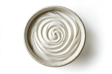 A swirl of creamy fresh Greek yogurt in a bowl, isolated on white background with a crisp clipping path to show off its smooth texture.