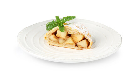 Piece of tasty apple strudel with powdered sugar and mint isolated on white