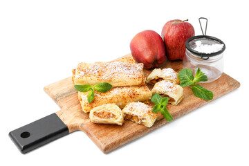 Tasty apple strudels with powdered sugar, fruits and mint isolated on white