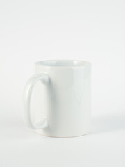 Two-tone 11oz mug on isolated background. Mug with black handle and inner part.
