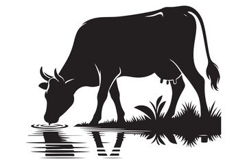 Silhouette of cow drinking water reflected in tranquil pond