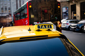 Yellow Taxi Car With Taxi Sign On A Roof