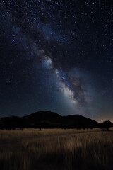Stunning Starry Night Sky with the Milky Way and Distant Mountains