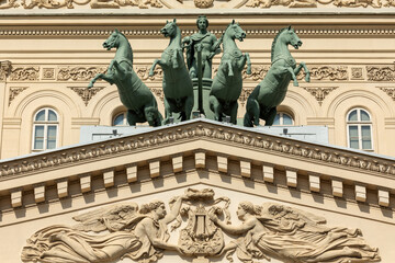 Obraz premium Bolshoi theatre of Moscow, Russia. Central facade and equestrian sculpture, upper part of the column in the Corinthian style