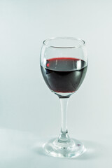 Glass of red cabernet sauvignon merlot pinot noir malbec wine isolated on white background