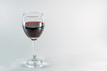 Glass of red cabernet sauvignon merlot pinot noir malbec wine isolated on white background