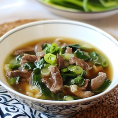 Thai noodle soup with pork. Korean food Songpyeon, Sliced pork bone soup.