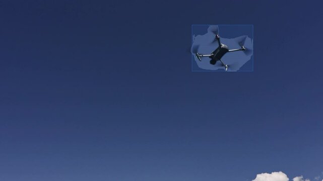 AI UAV Detection Drone Flying Blue Sky Clouds Tracking