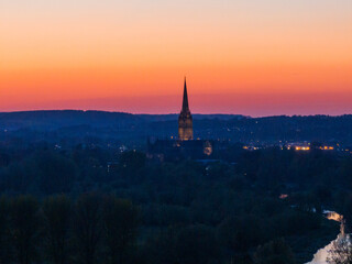 Fototapeta premium Aerial shot of Salisbury Cathedral at sunset