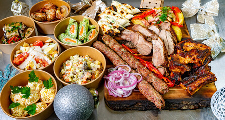 Delicious assortment of grilled meats and side dishes for a feast