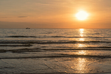 Boats on the sea during sunset