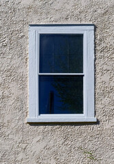 Window on house exterior wall