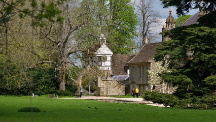 old buildings in the English village Lacock at beautiful sunny day