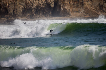 When La Herradura wakes up, only the fearless paddle out. Walls of water, raw Pacific energy, and a...