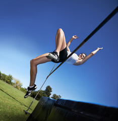Woman, sports and high jump athlete for training outdoor for competition health, endurance or...