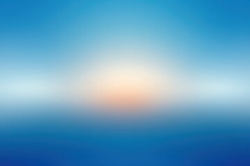 Fototapeta premium Blurred blue and orange background with a sun setting at the center.