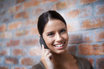 Phone call, portrait or happy woman by a wall in office for communication, gossip or chat. Talking,...