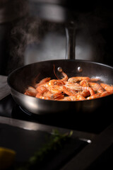 King prawns frying in a hot pan