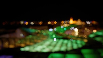 Defocused lights creating bokeh effect at night