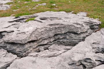 A large rock with a crack in it