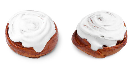 Tasty cinnamon rolls with cream isolated on white