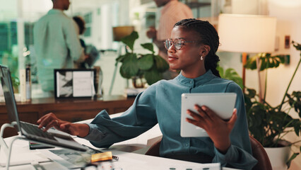 Happy, tablet and woman with laptop, office and media strategist with info, typing and digital...